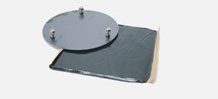 Sticky mastic and plate for temporary delineator installation